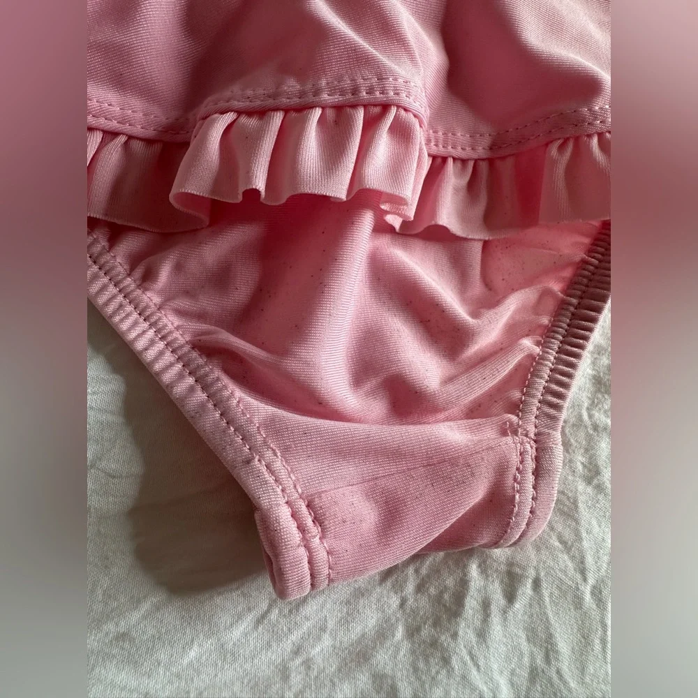 Baby pink swimsuit size 6-9 months